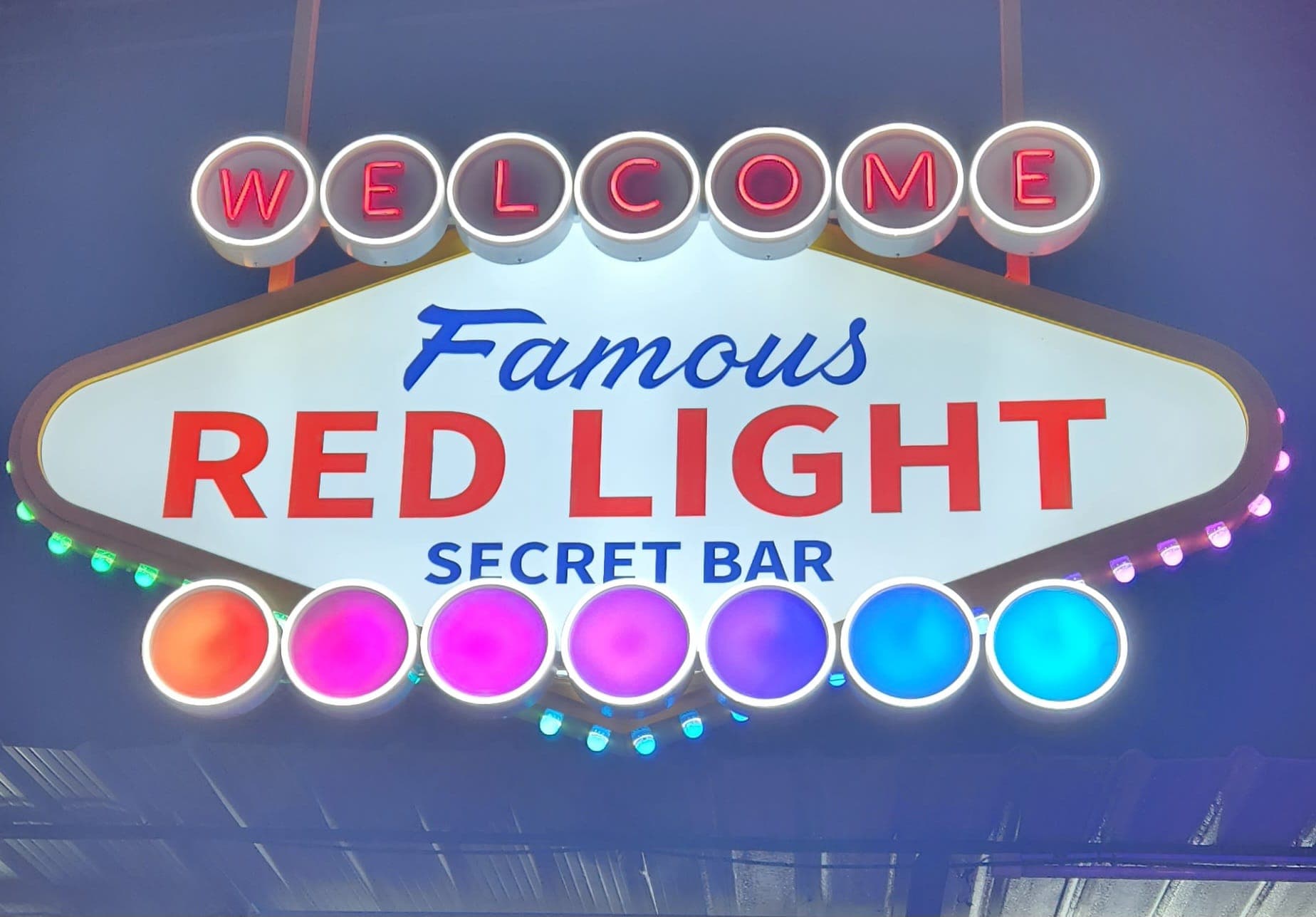 The Photo showing the exterior, interior, staff, and atmosphere of Red Light Secret Bar Pattaya